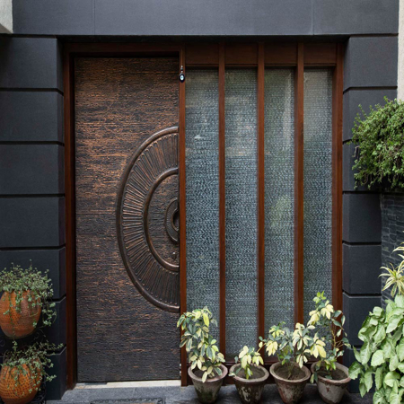 Sculpted Copper Entrance Door